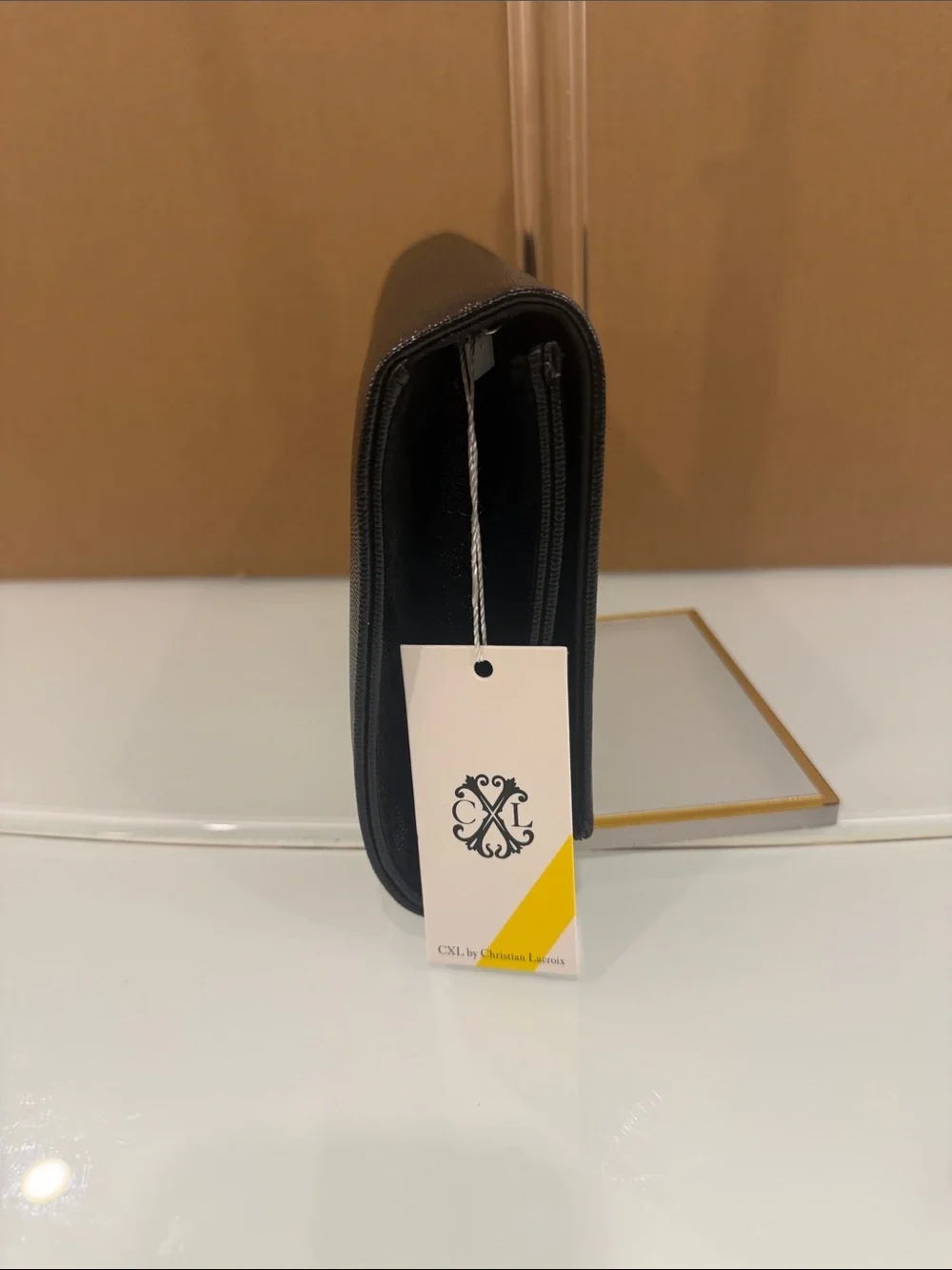 Black Leather Crossbody Bag with Gold Logo Accent